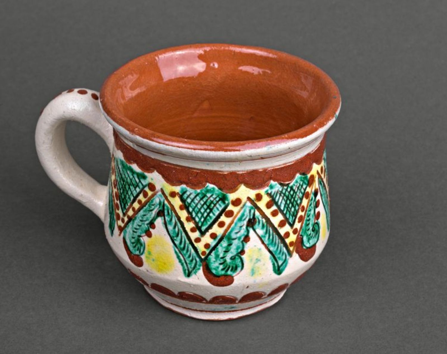 Clay decorative glazed 5 oz cup with handle and green color photo 1