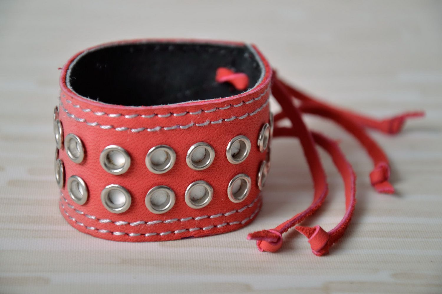Wide pink leather bracelet with rivets photo 1