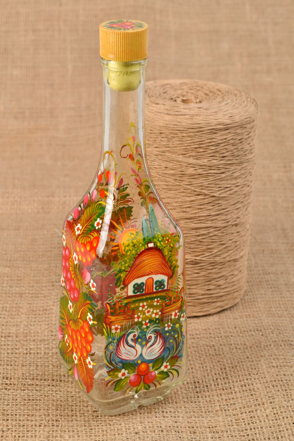 Handmade decorative bottle with ethnic painting in bright colors for 0.5 l Storks photo 1