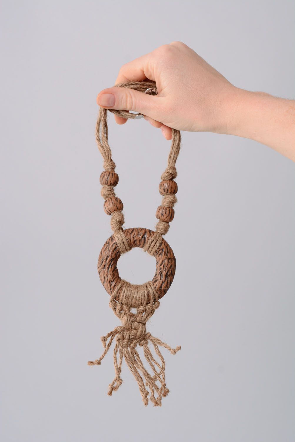 Woven necklace with plastic beads photo 4