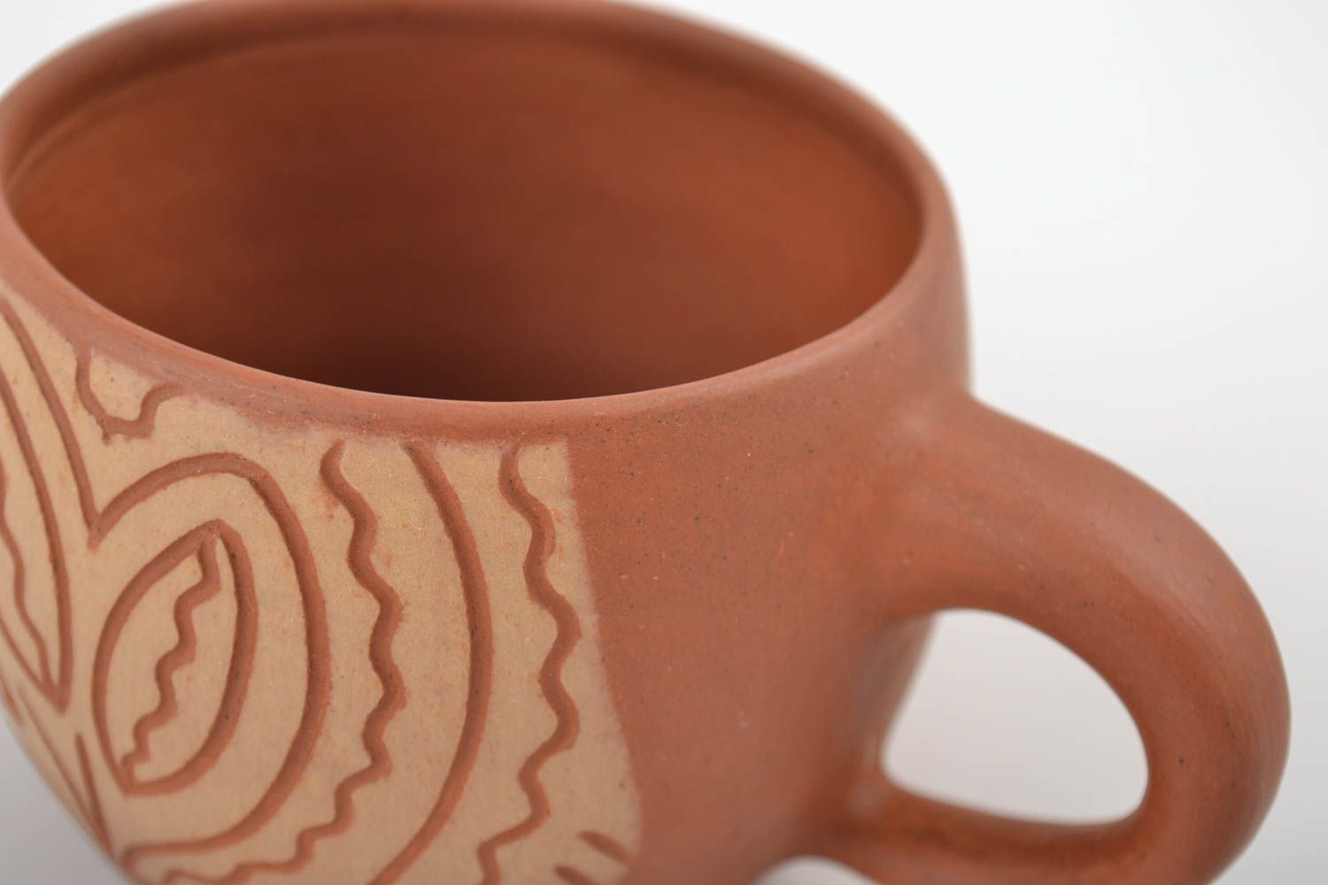 6 oz terracotta clay coffee cup with cave drawings and a handle photo 5