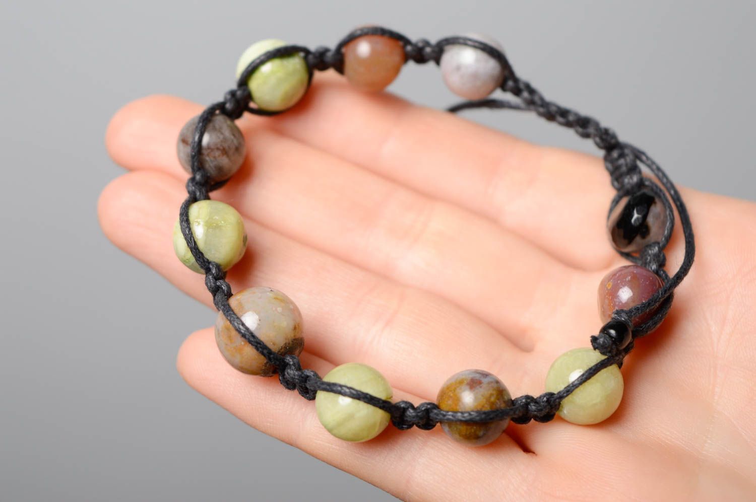 Woven bracelet with natural stones photo 5