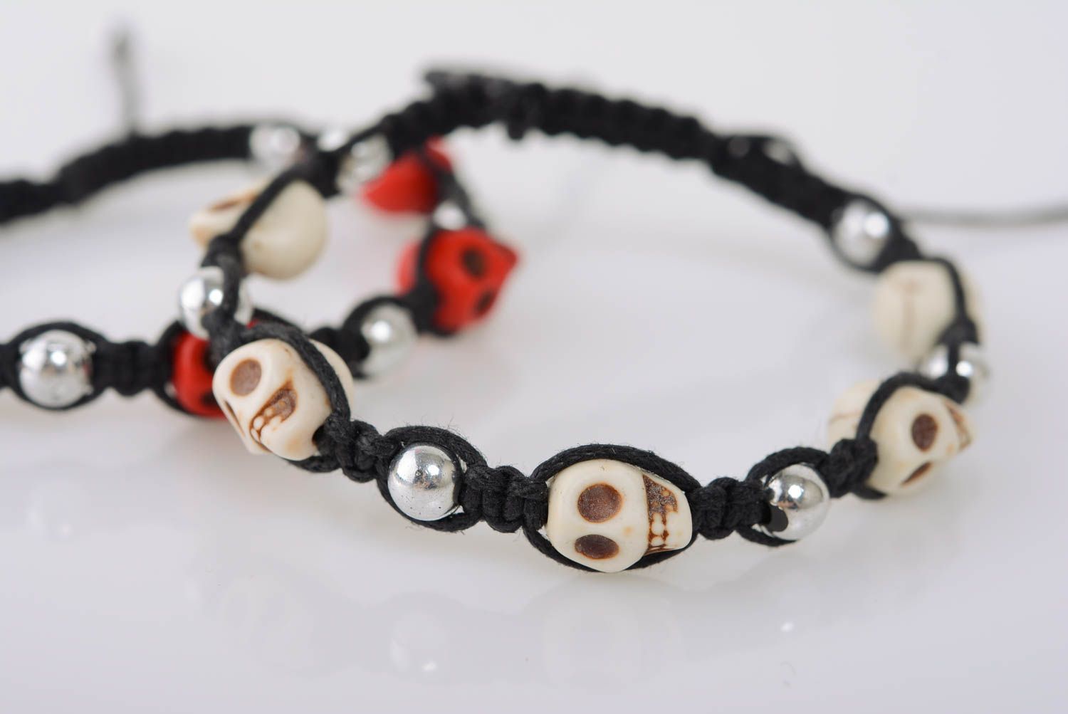 Beautiful unuusal designer handmade woven cord bracelet with beads and skulls photo 4