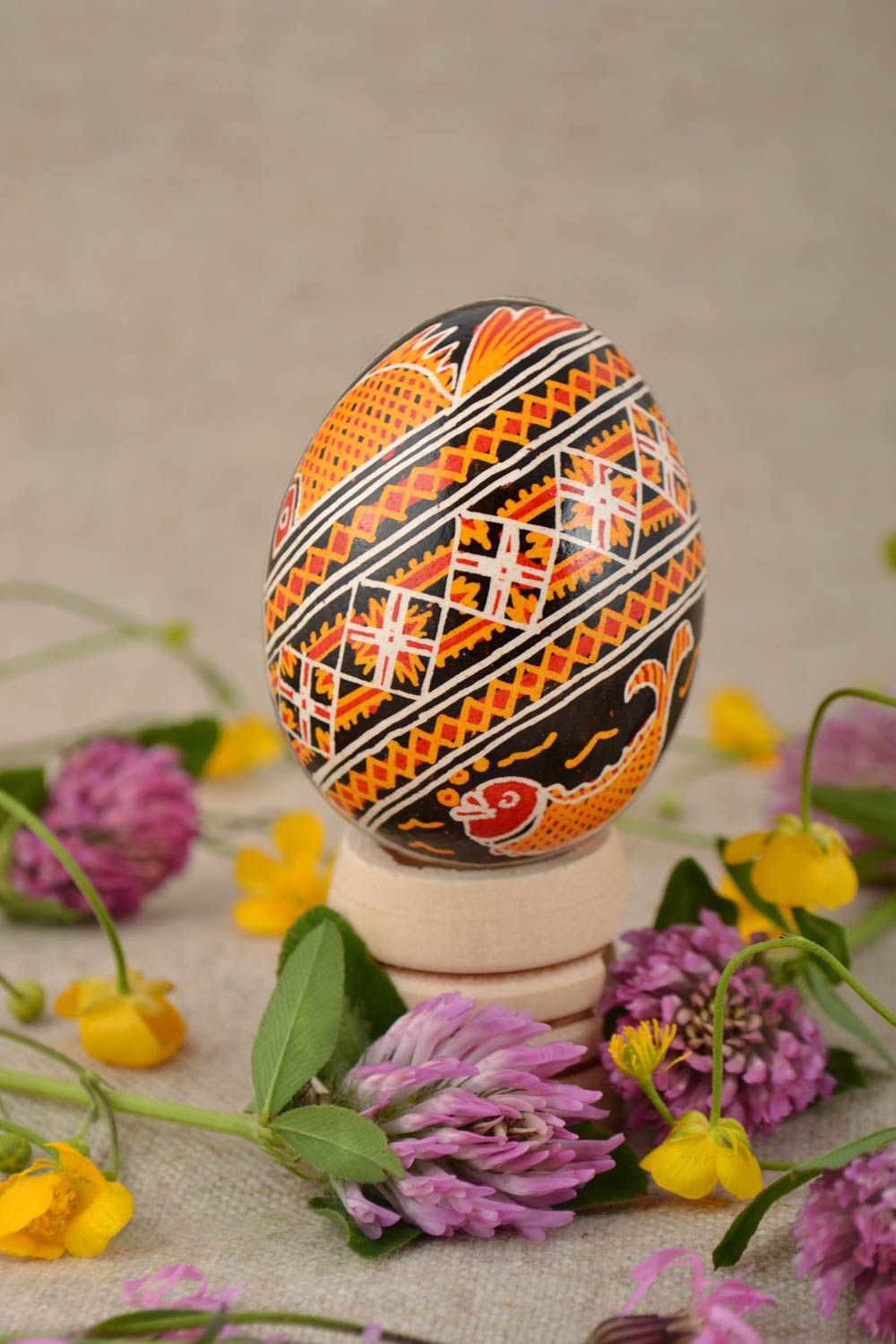 Easter egg painted with acrylic dyes handmade chicken egg with fish pattern photo 1