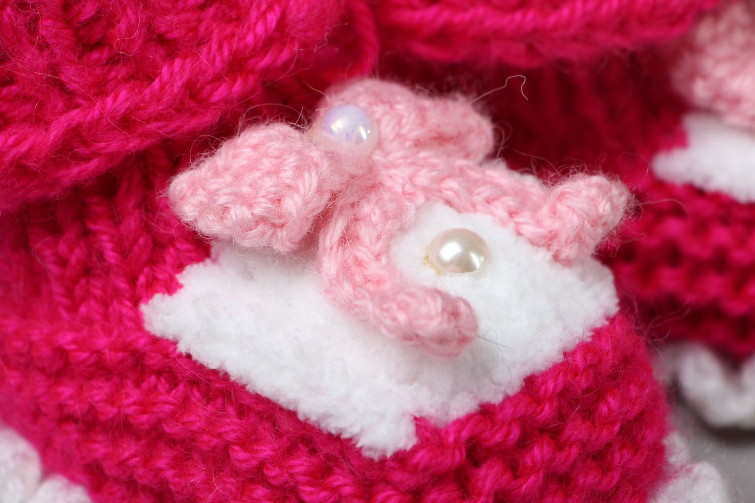 Knitted baby booties with bows photo 3