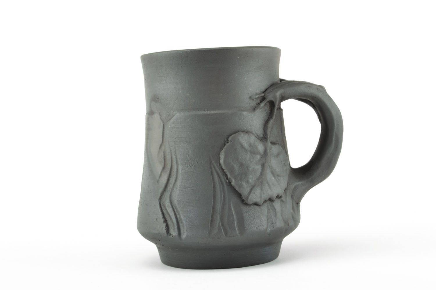 Black clay natural smoked cup with handle and autumn molded leaves pattern photo 1