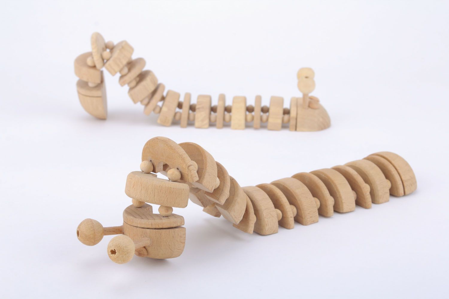 Wooden toy caterpillar photo 1