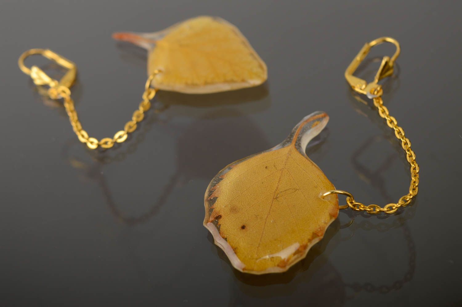 Dangle earrings with real birch leaves coated with epoxy photo 1
