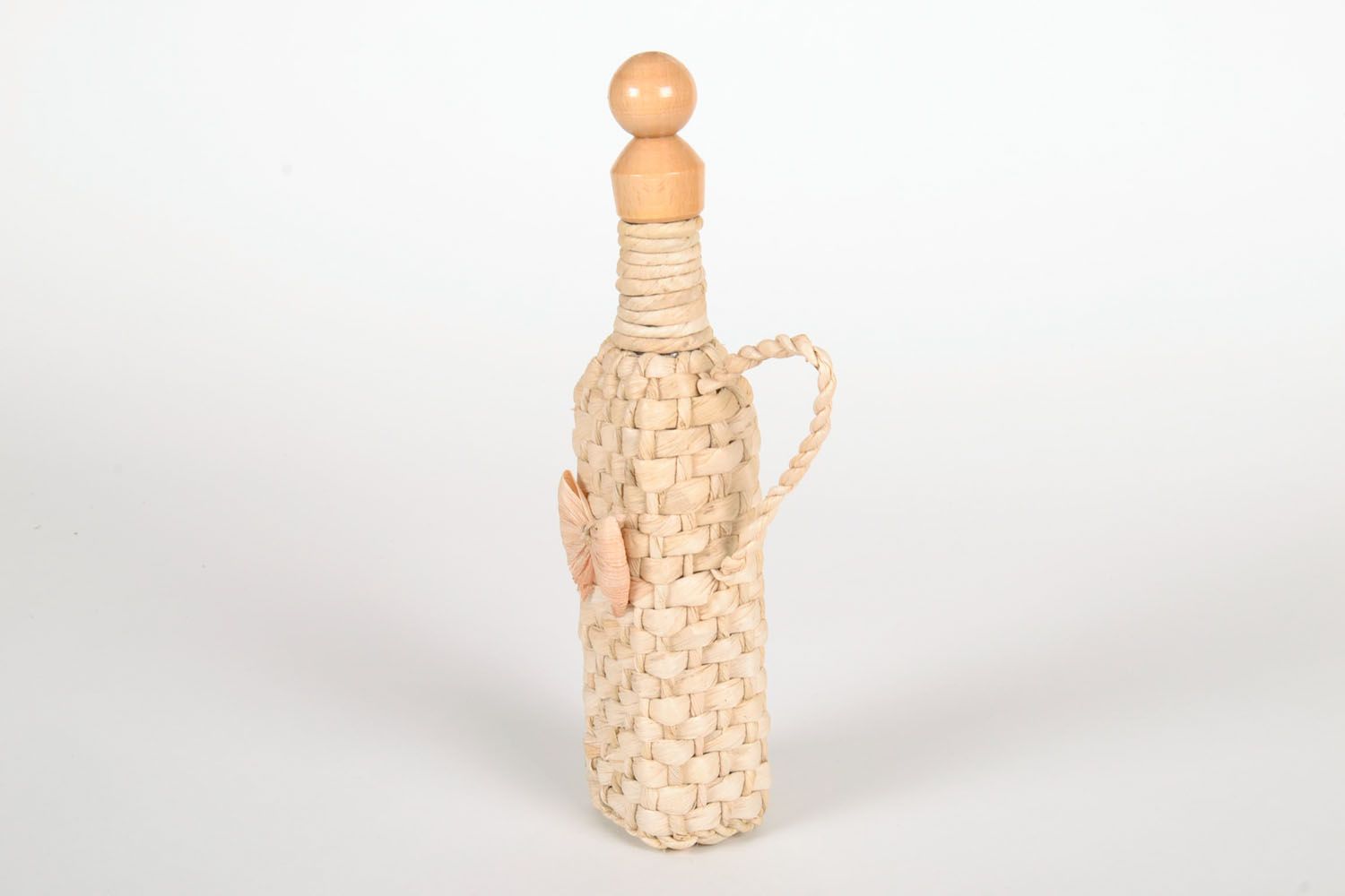 Bottle braided with corn leaves photo 3
