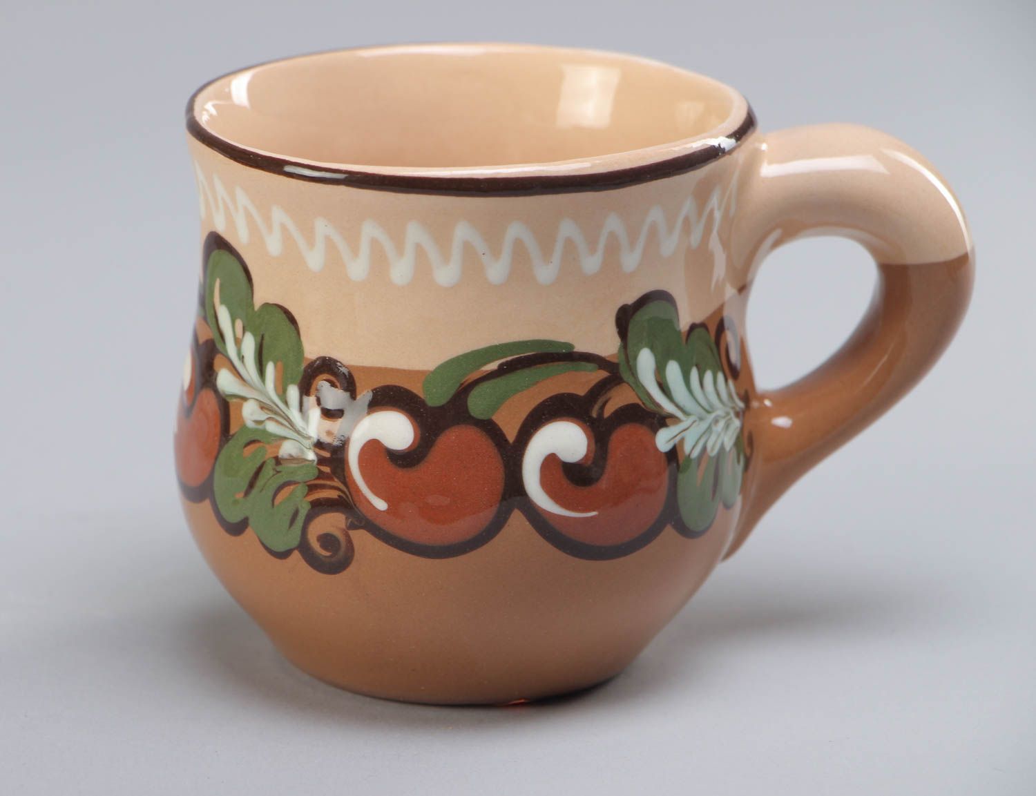Mit Glasur bemalte Tasse aus Ton fpr Kaffe oder Tee schöne Designer Handarbeit foto 2