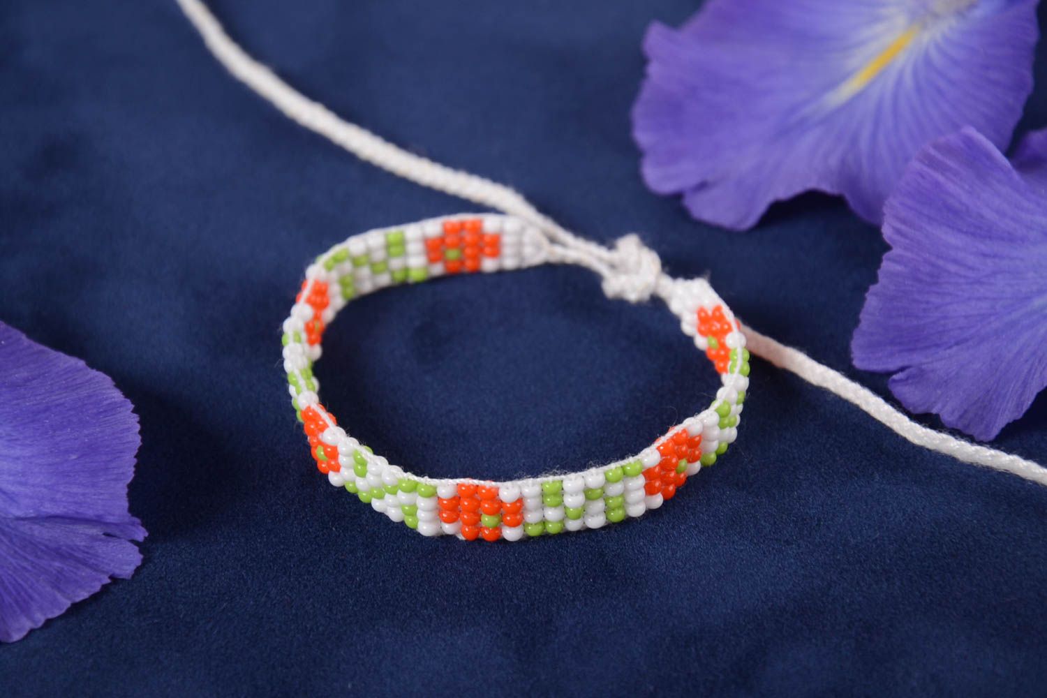 White rope thin line bracelet with red, white, and green beads photo 1