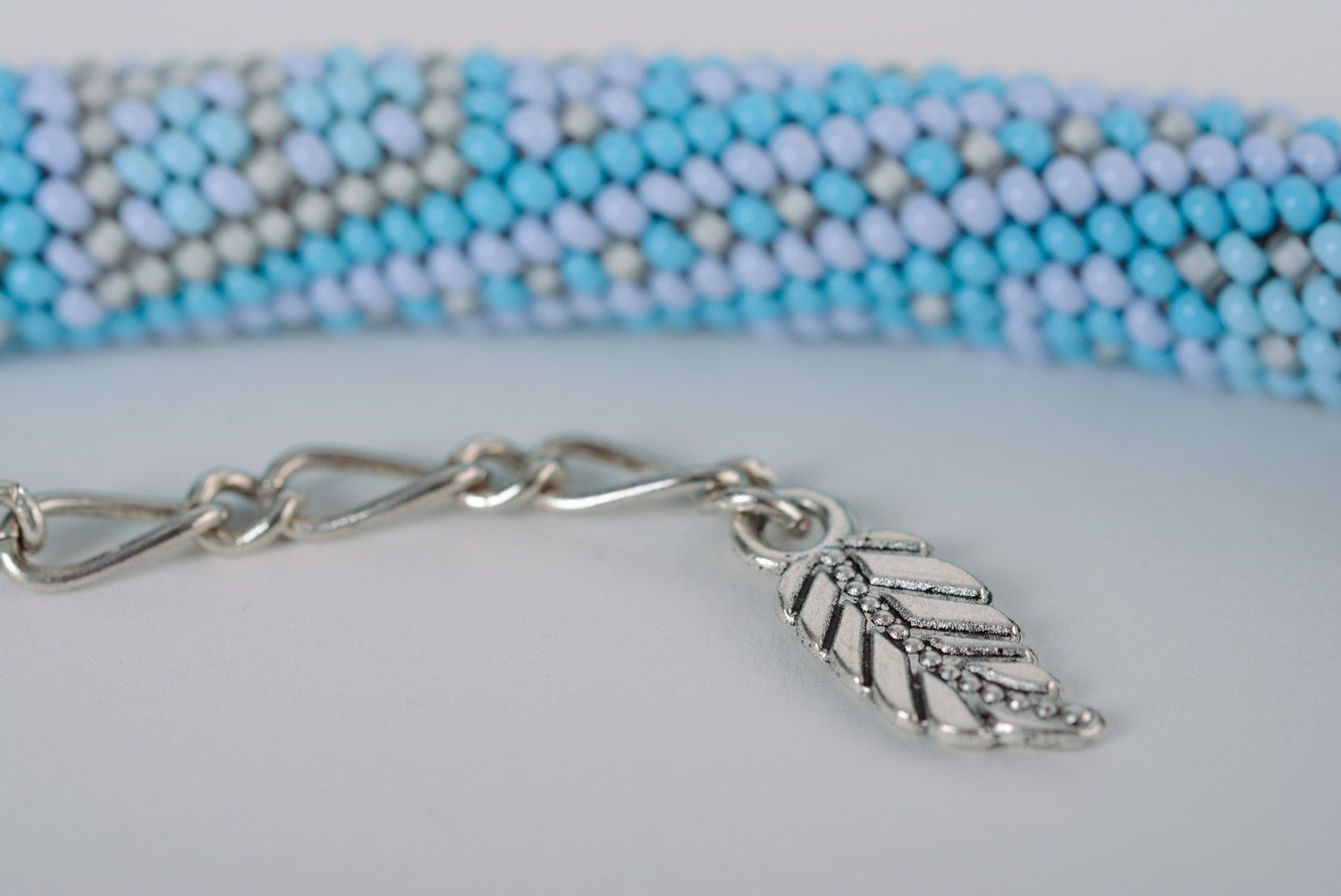 Blue handmade woven beaded cord bracelet with chain and pearl-like beads photo 5