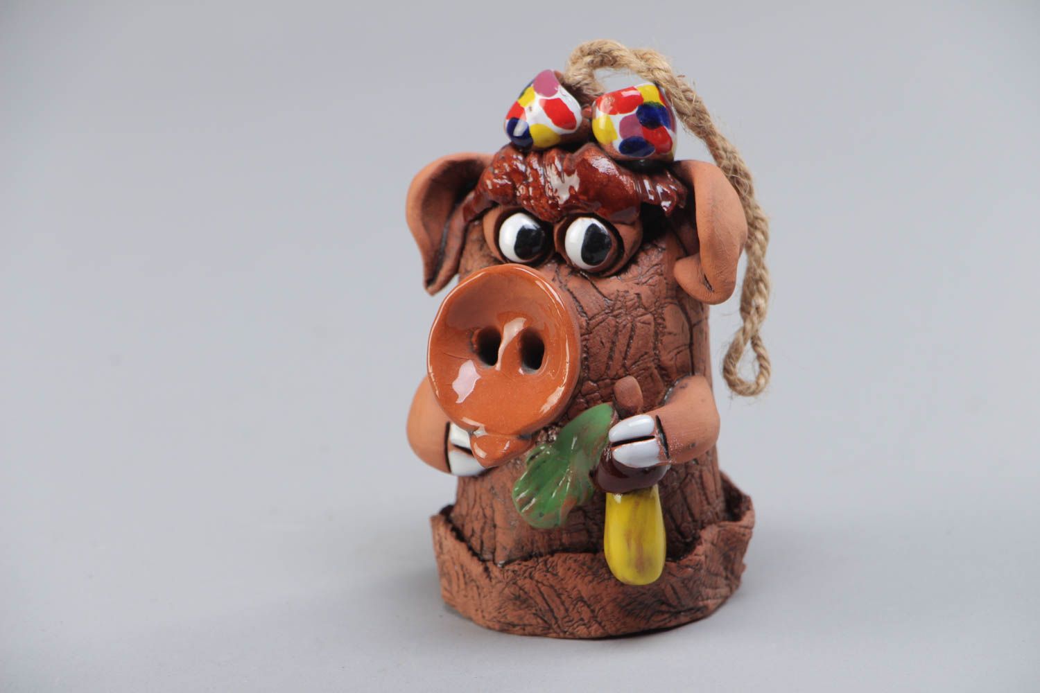 Beautiful small handmade designer painted ceramic bell in the shape of pig photo 2
