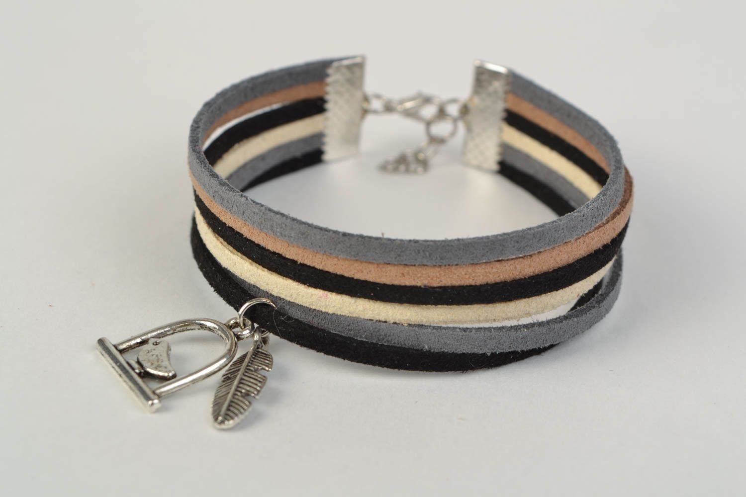 Homemade woven suede bracelet with metal charm in the shape of bird and feather photo 3