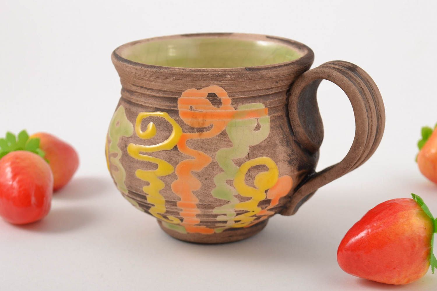 Ceramic pot style rustic teacup with orange, olive, yellow patterns. 6 oz, wide handle. photo 1