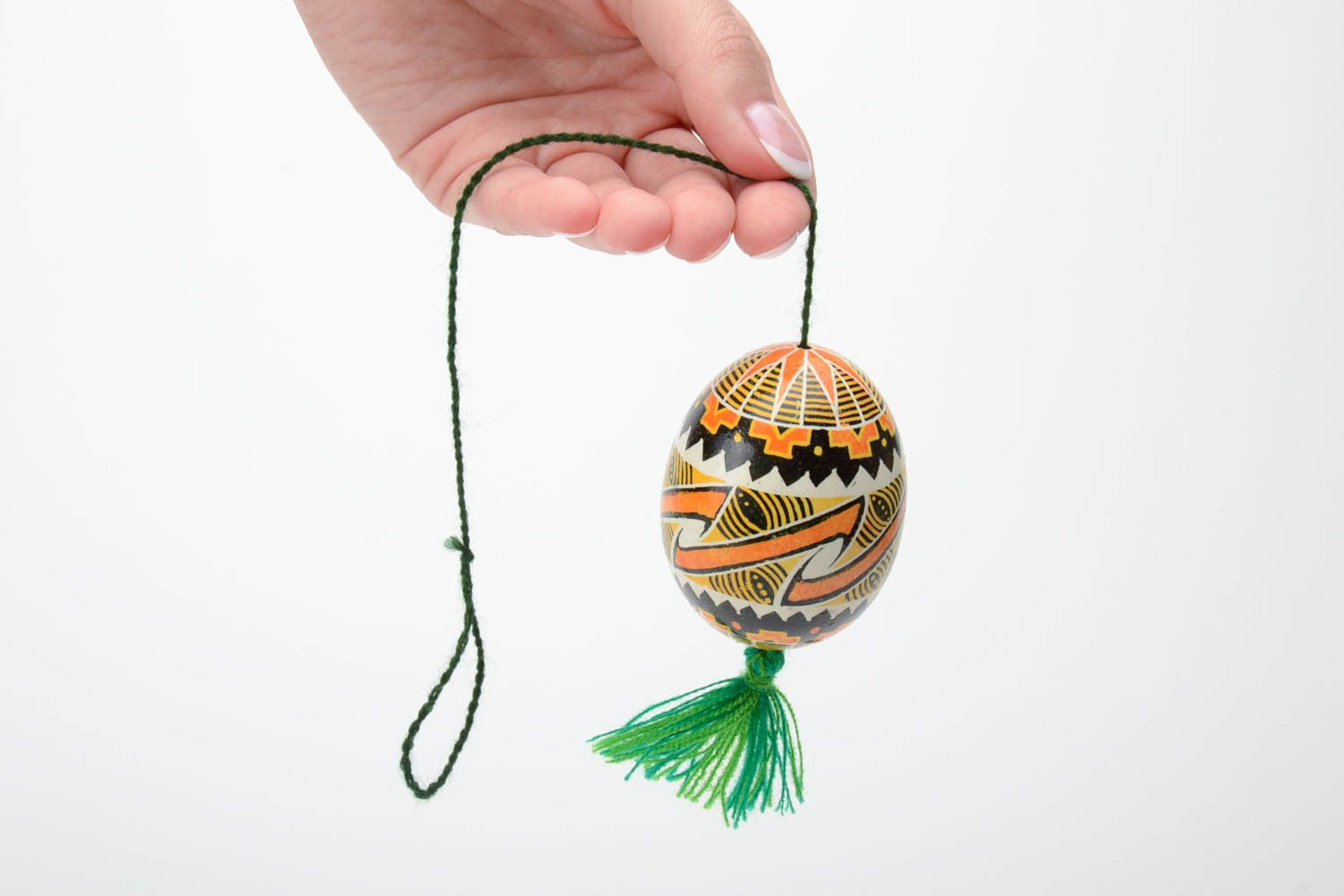 Handmade traditional wax painted colorful Easter egg with green tassel photo 5