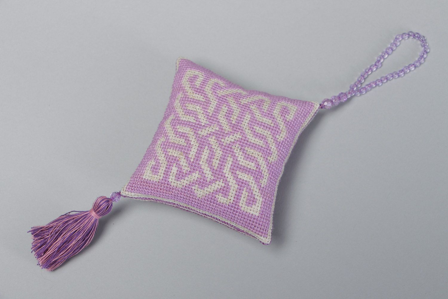 Handmade violet fabric pincushion with cross stitch embroidery and tassels photo 3