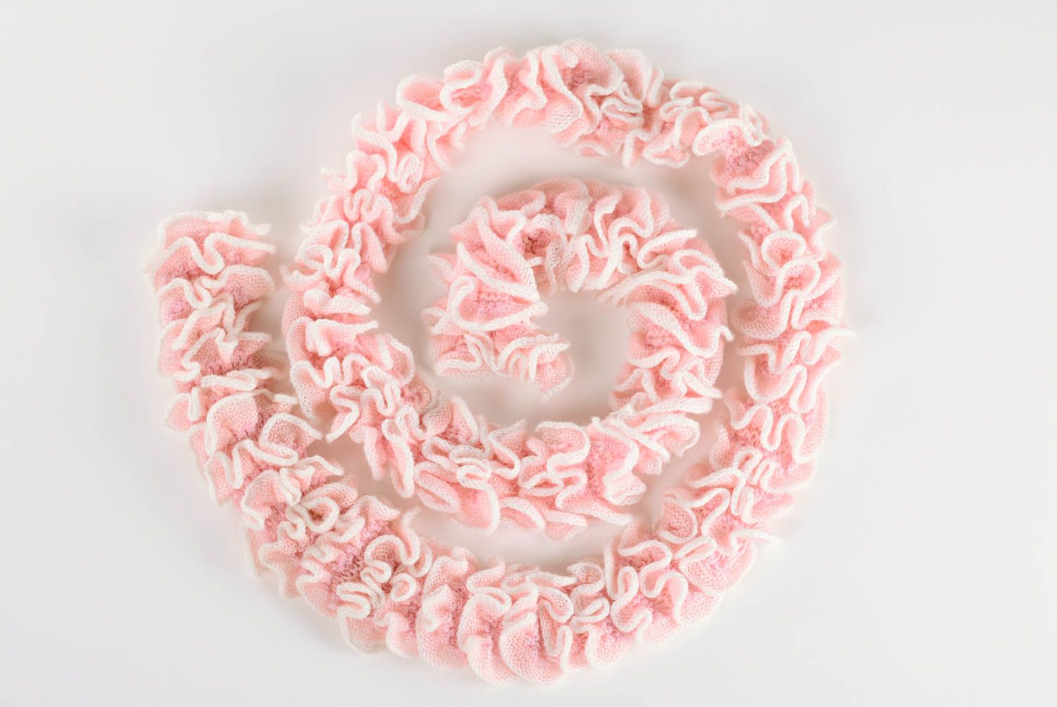 Lenço de cor rosa tricotado com raios foto 1