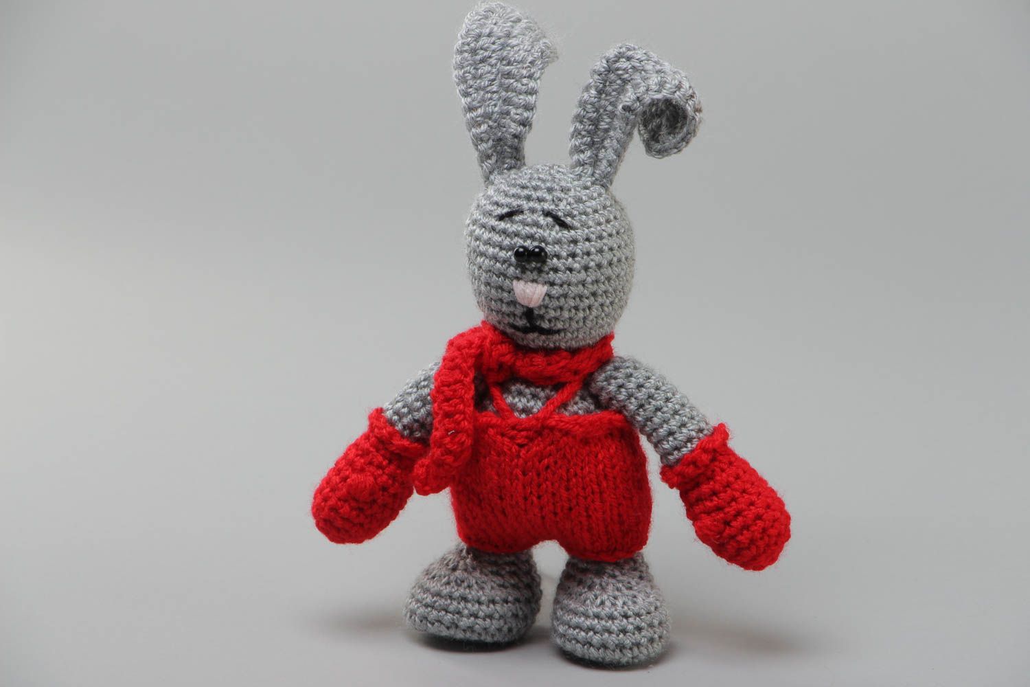 Handmade soft toy gray rabbit crocheted of acrylic threads with red scarf  photo 2