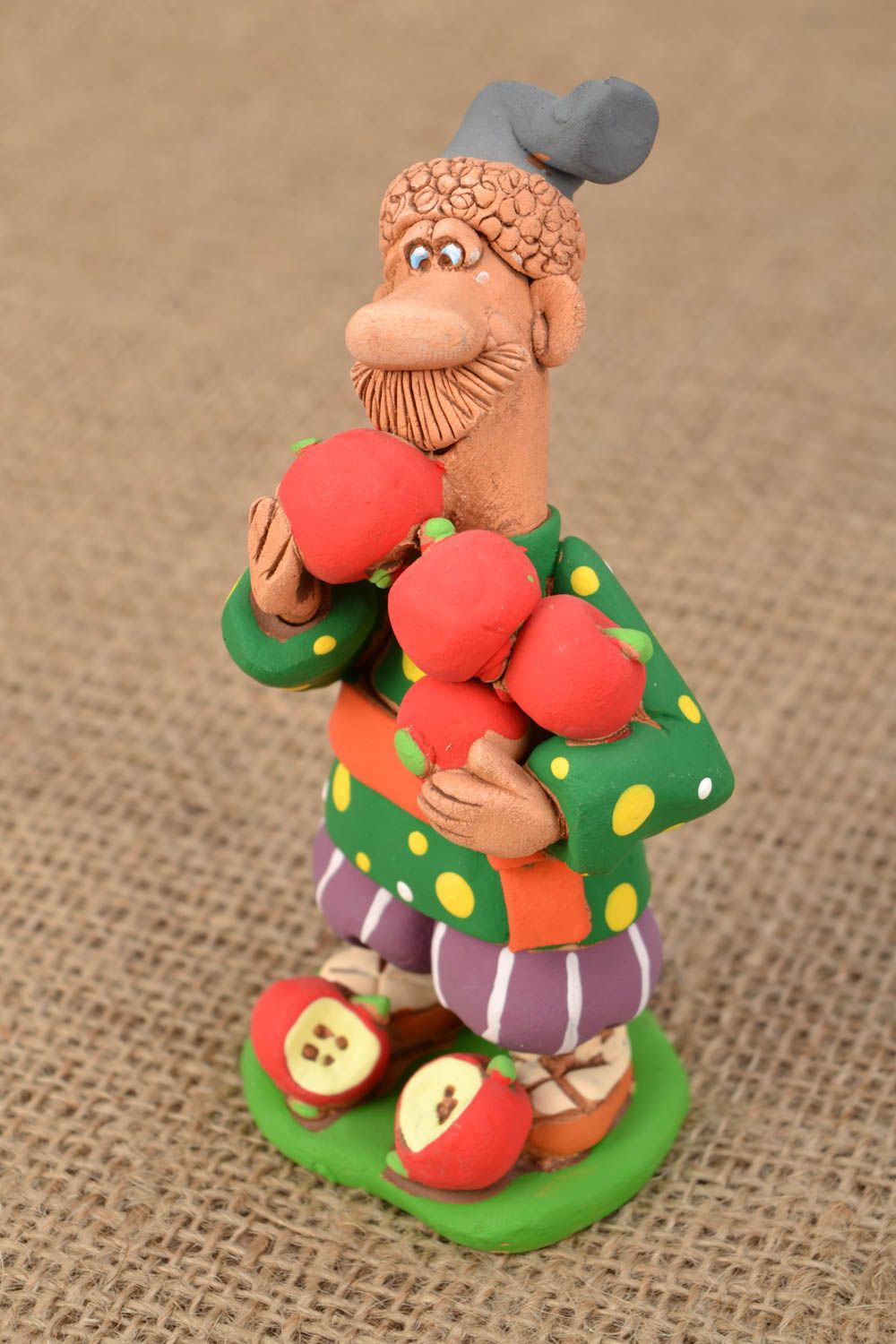Ceramic figurine Man and Apples photo 1