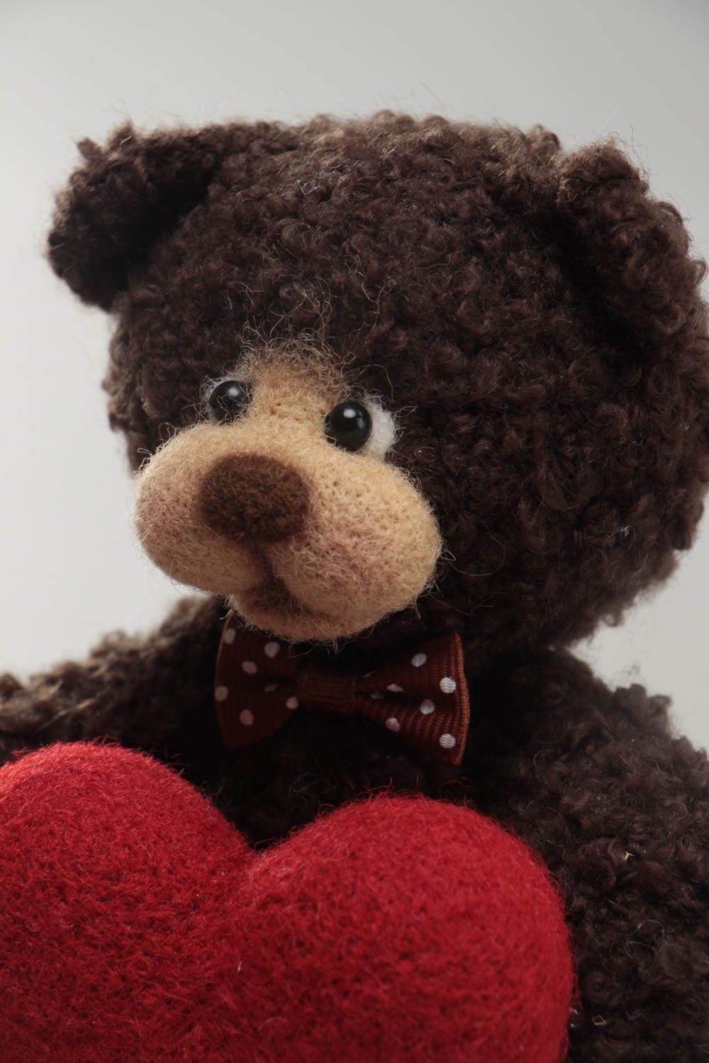 Handmade soft toy crocheted of wool and yarns brown bear with big red heart photo 3