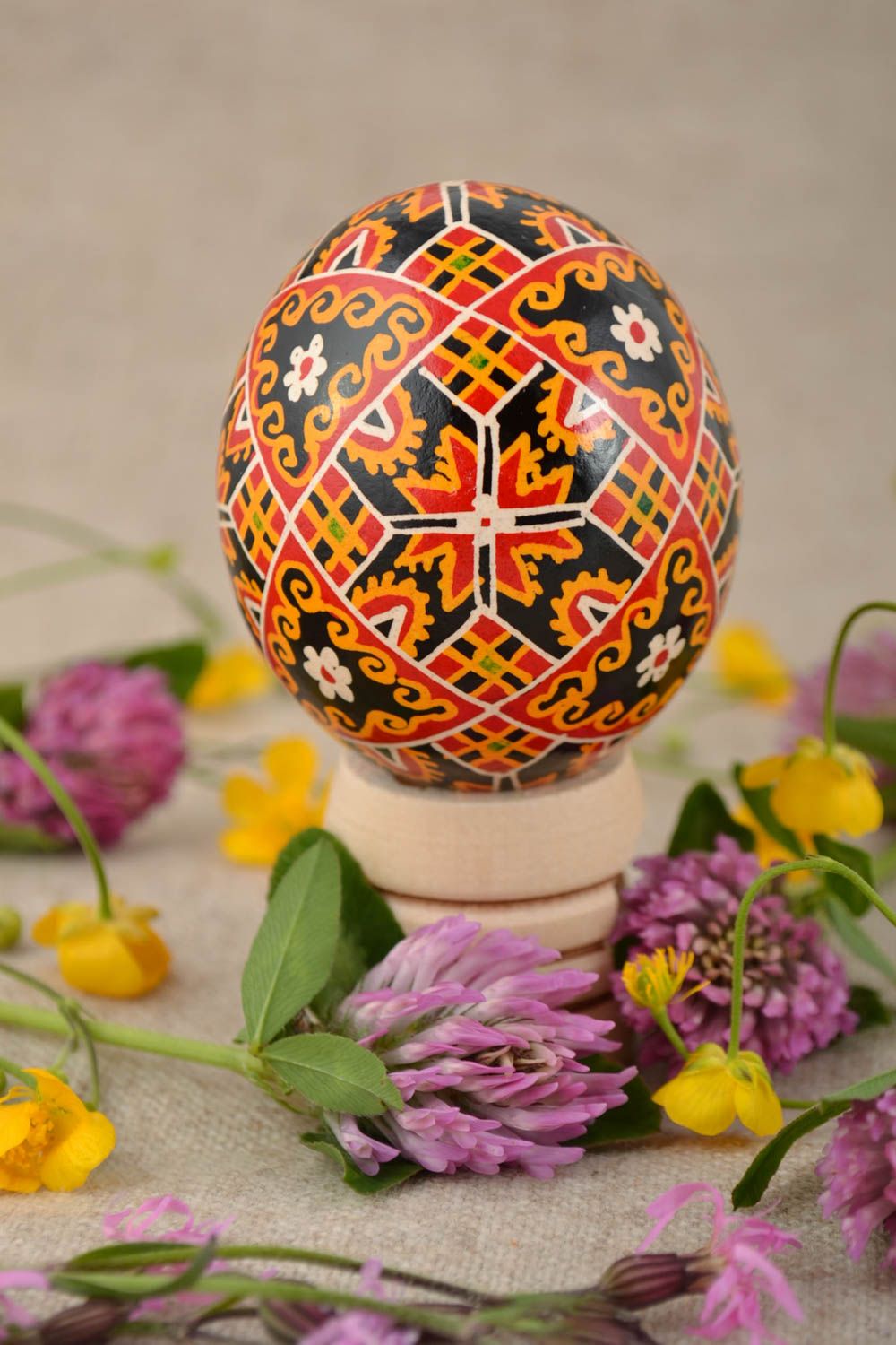 Bright decorative ornamented Easter chicken egg pysanka painted with acrylics photo 1