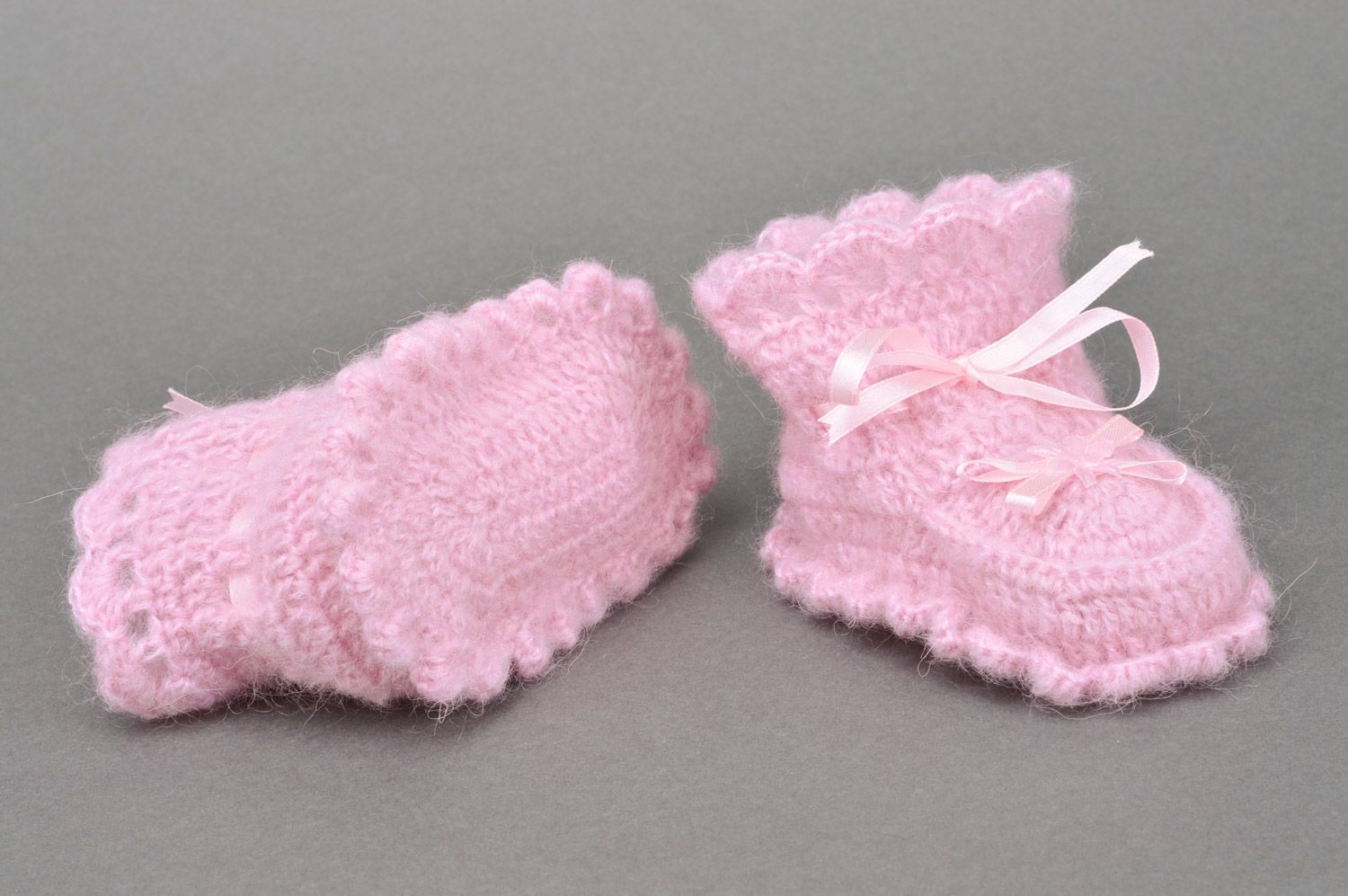 Handmade crocheted baby booties for girls made of angora in pink color with bows photo 5