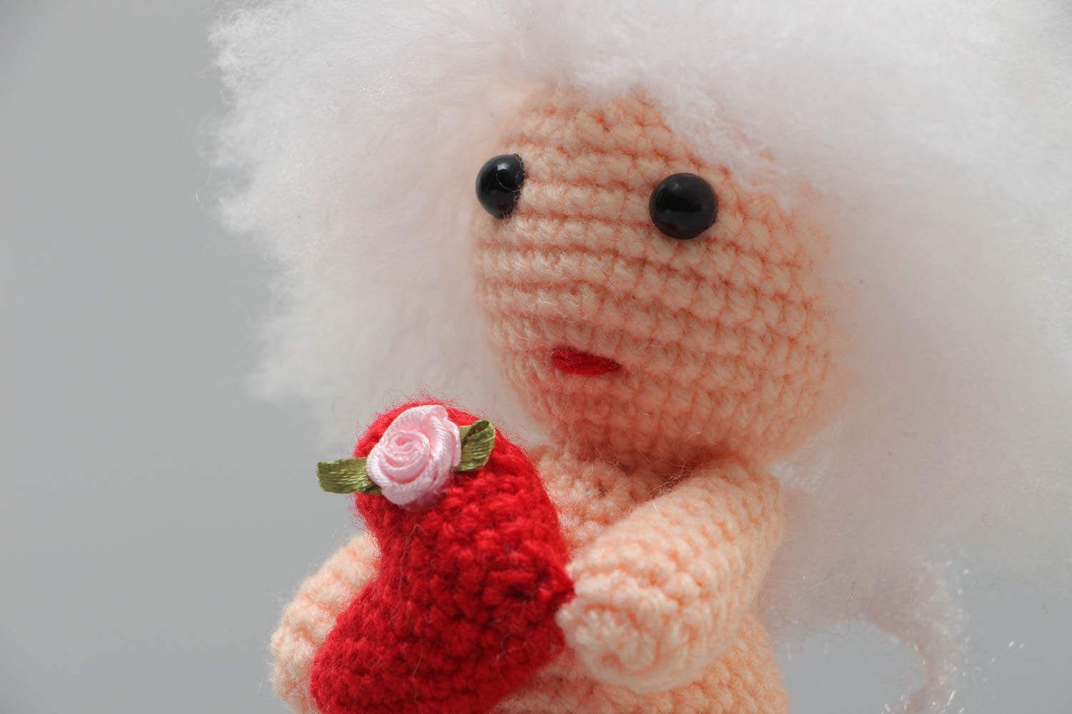 Handmade soft crochet toy in the shape of cute curly cupid with red heart photo 3