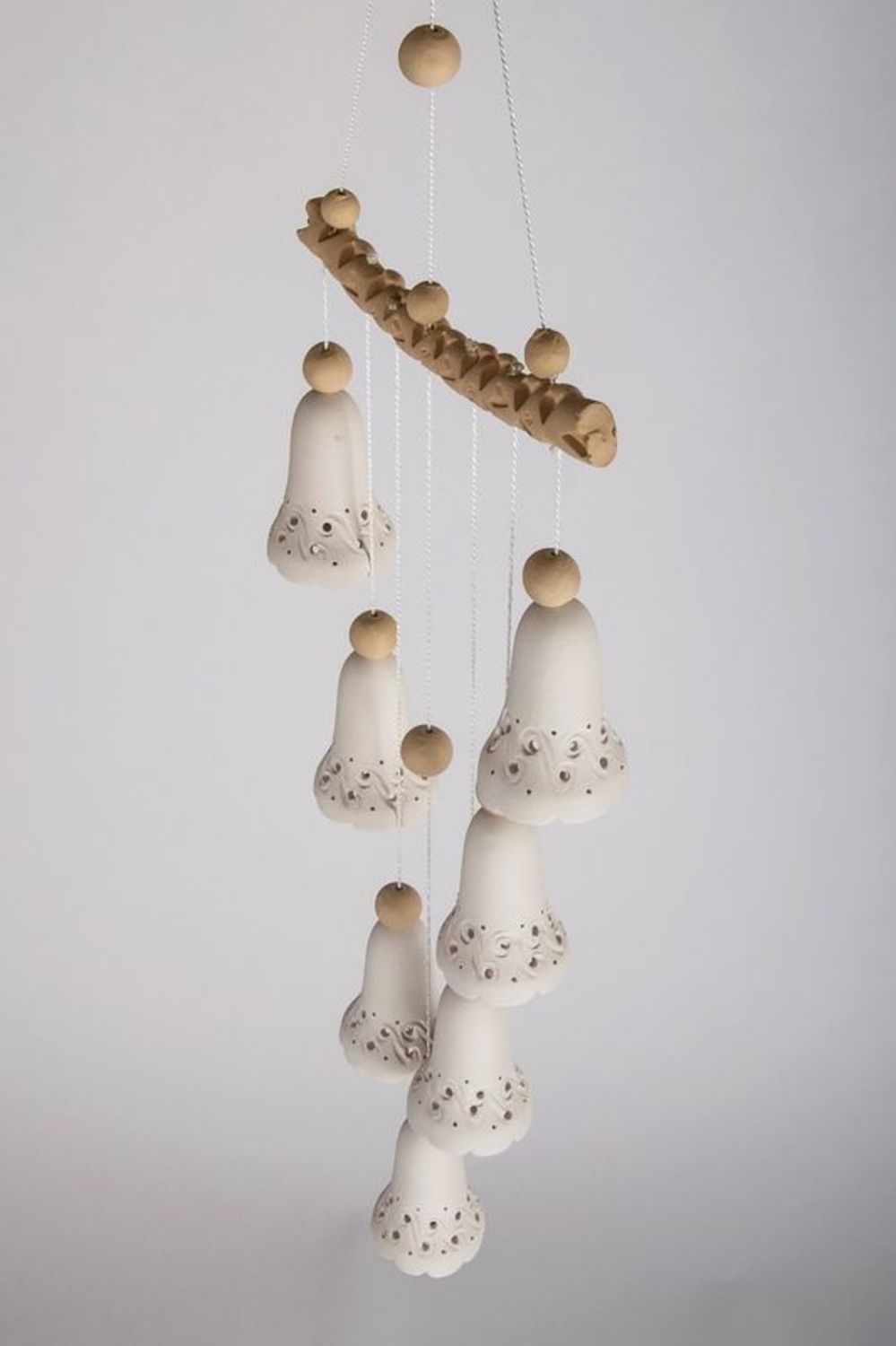White and brown ceramic bells  photo 2