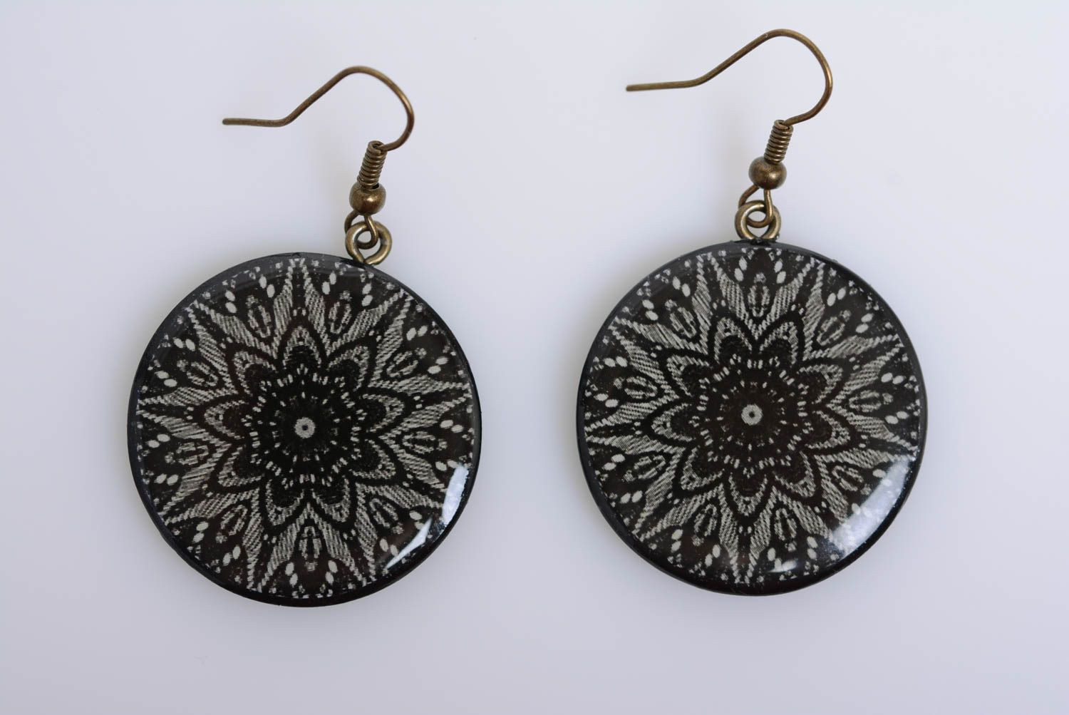 Handmade round ornamented dark polymer clay dangling earrings with decoupage photo 1