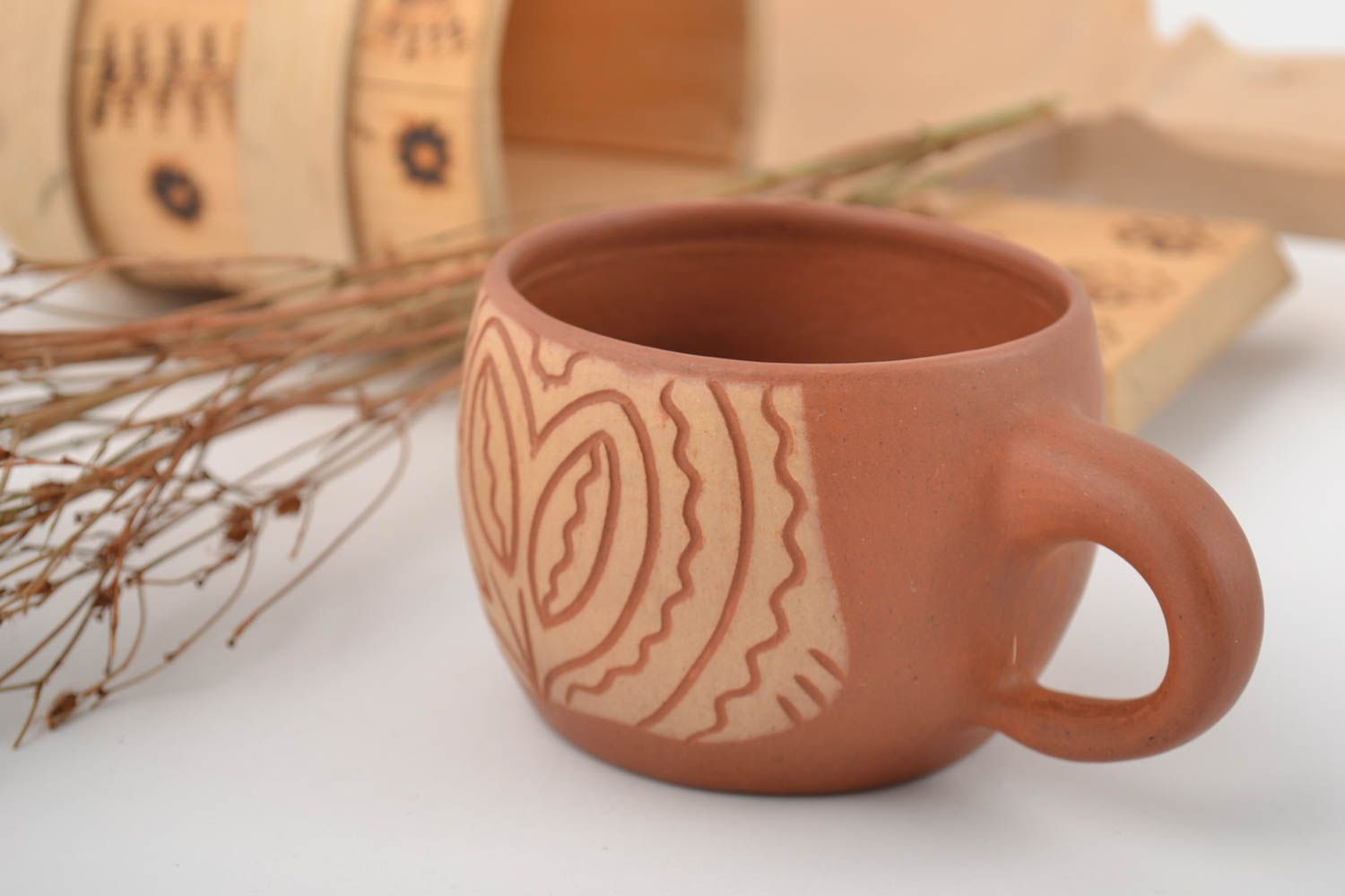 6 oz terracotta clay coffee cup with cave drawings and a handle photo 1