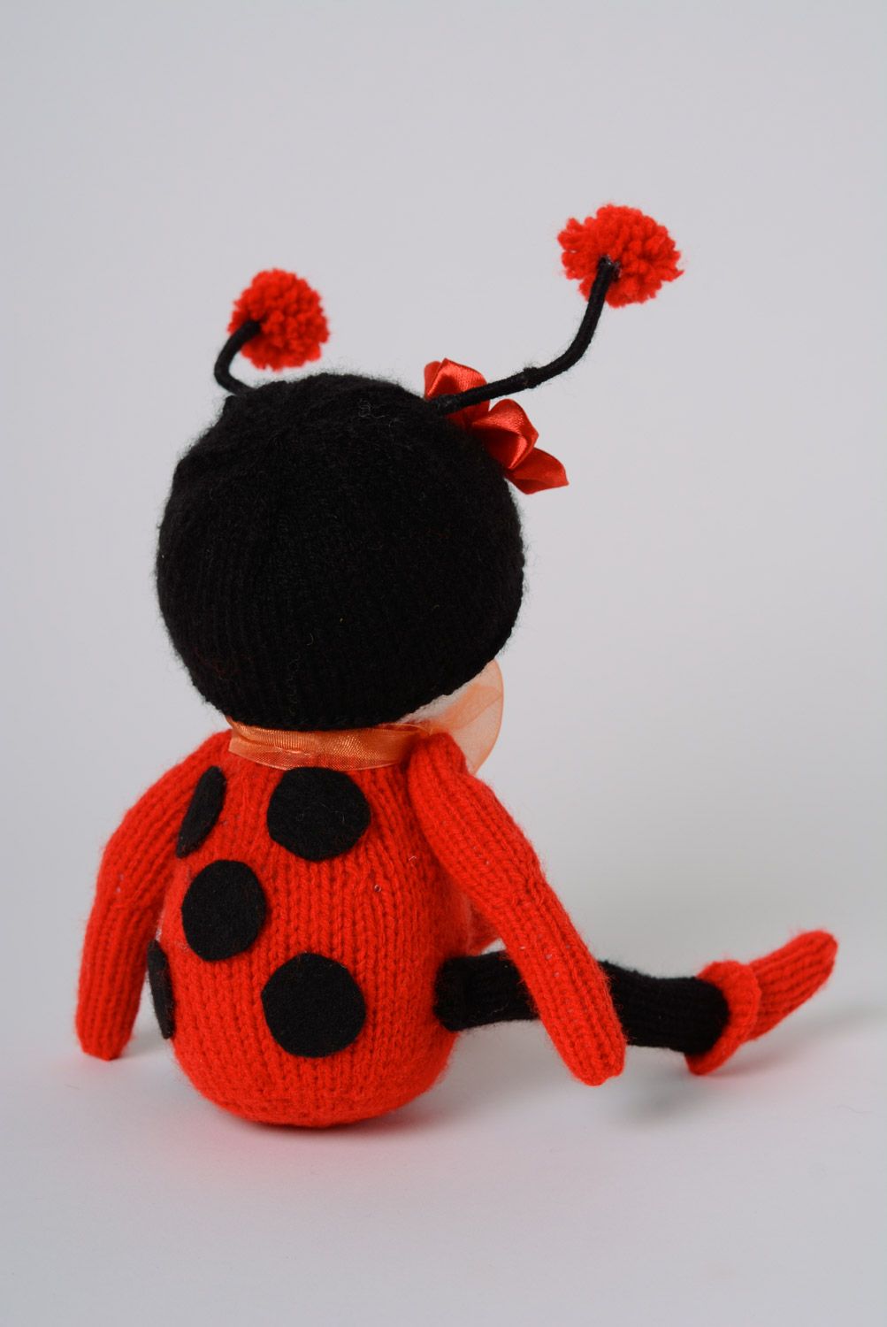 Red and black handmade soft toy crochet of acrylic threads photo 3