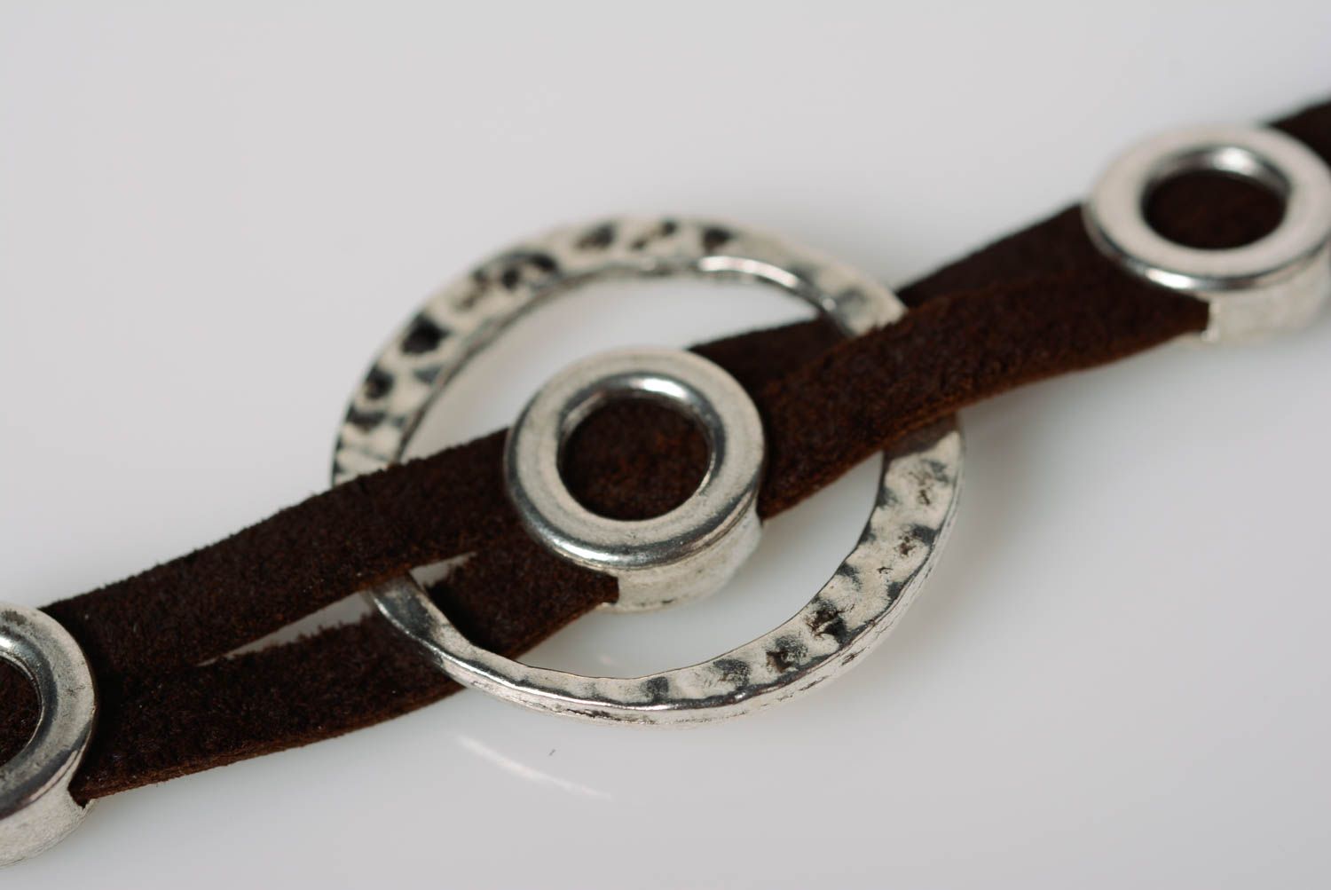 Beautiful handmade designer brown genuine leather wrist bracelet with metal inserts photo 5