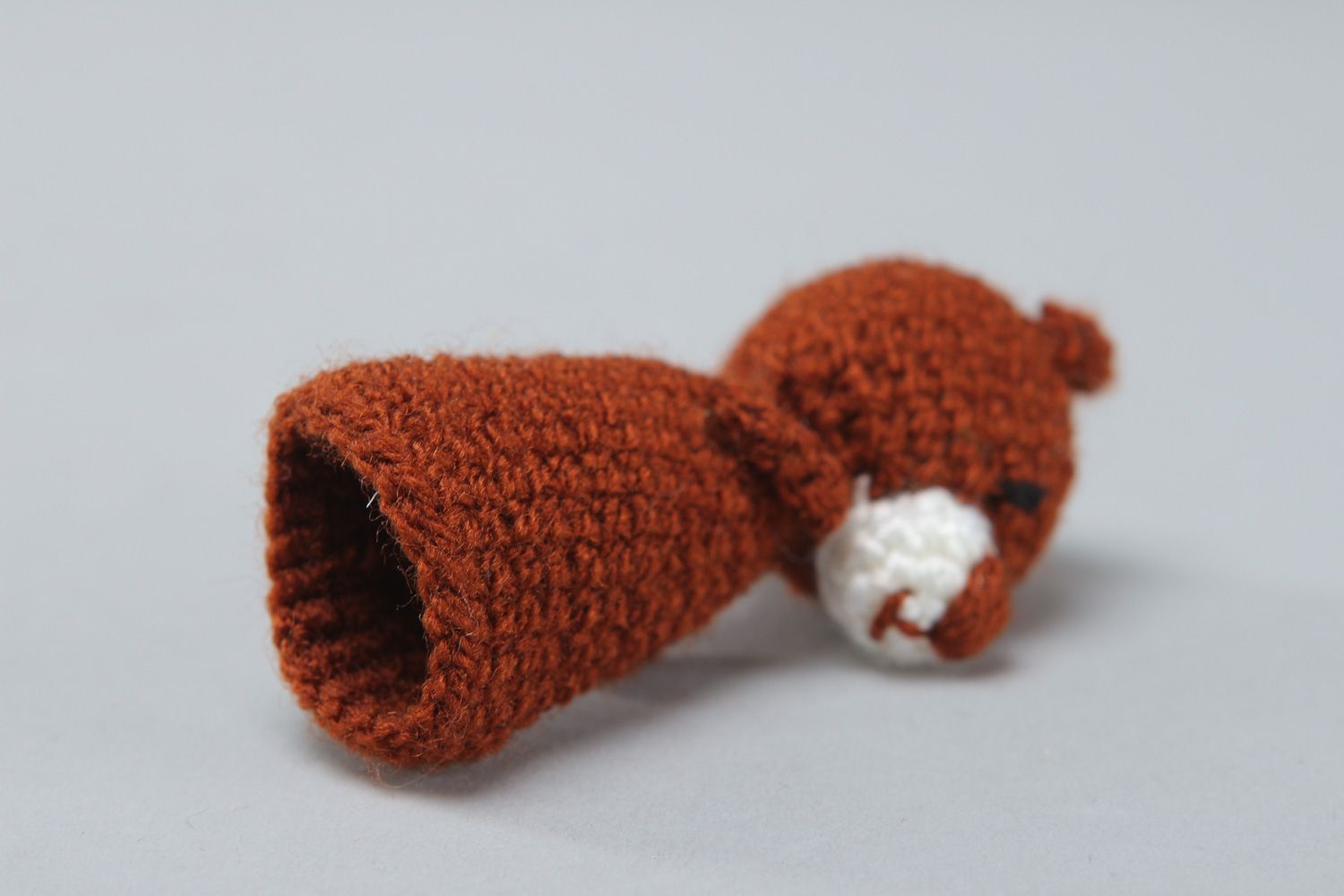 Handmade finger puppet in the shape of brown bear crocheted of acrylic threads photo 3