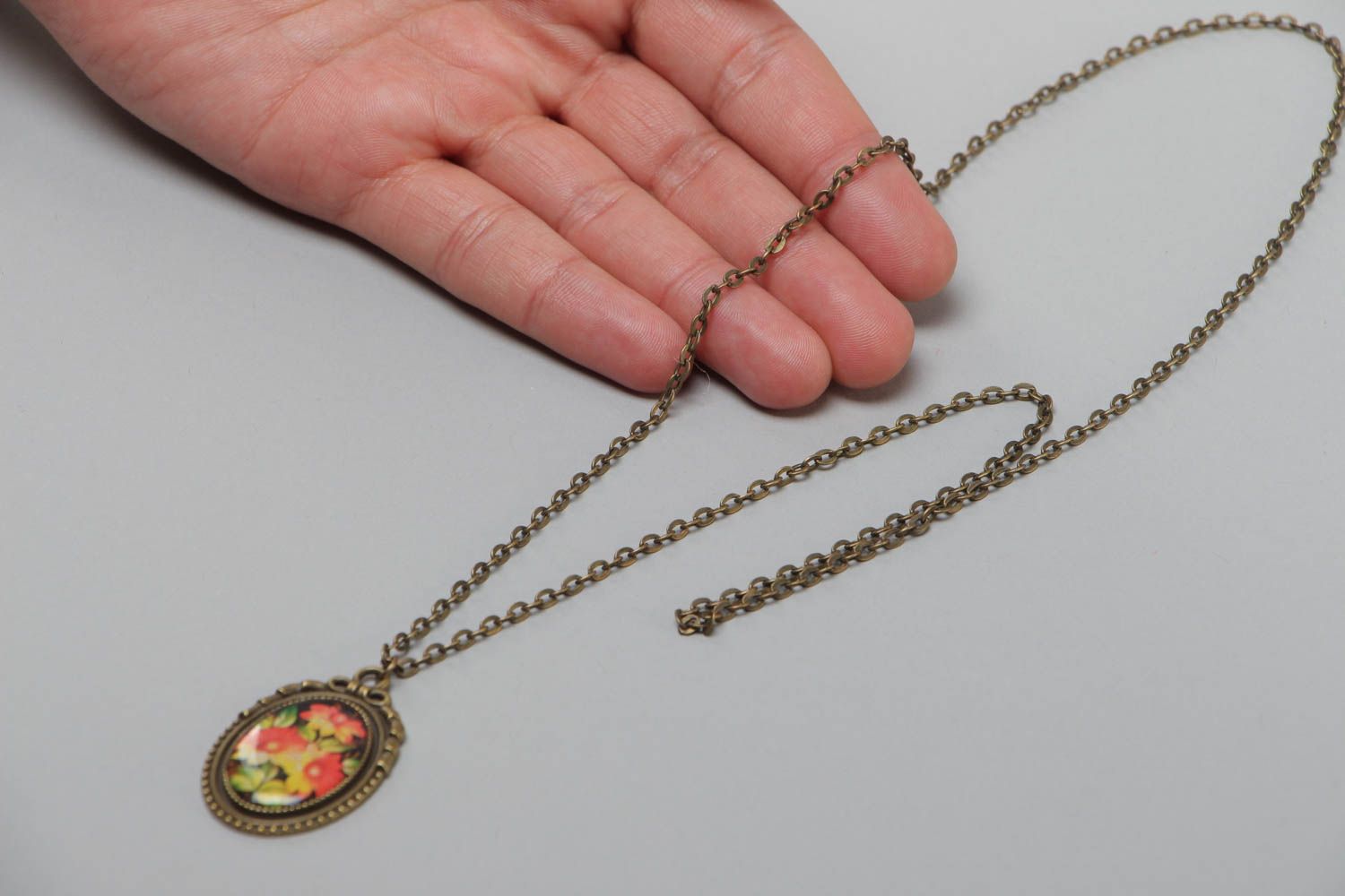 Handmade oval pendant with glass glaze and metal basis on long chain Flowers photo 5