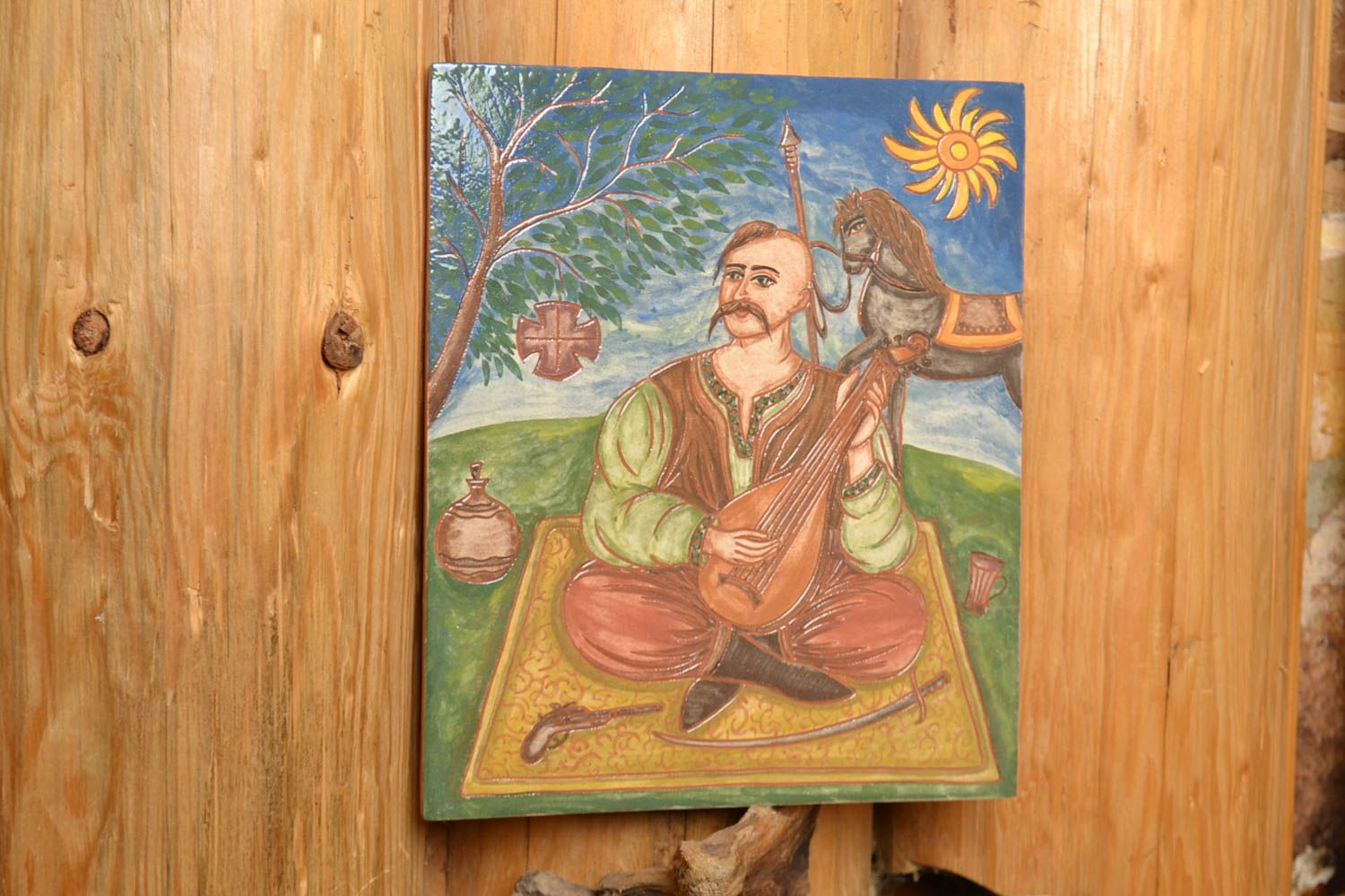 Handmade designer ceramic decorative facing tile painted with engobes Cossack photo 1