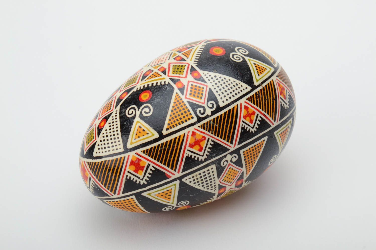 Handmade decorative dark painted goose egg with geometric ornament Easter souvenir photo 2