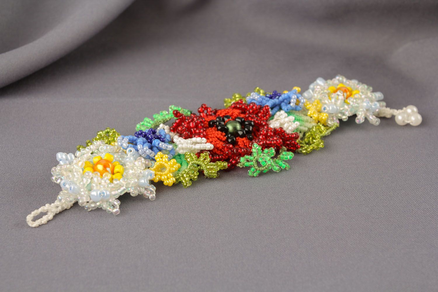 Friendship bracelet woven of beads and threads photo 2