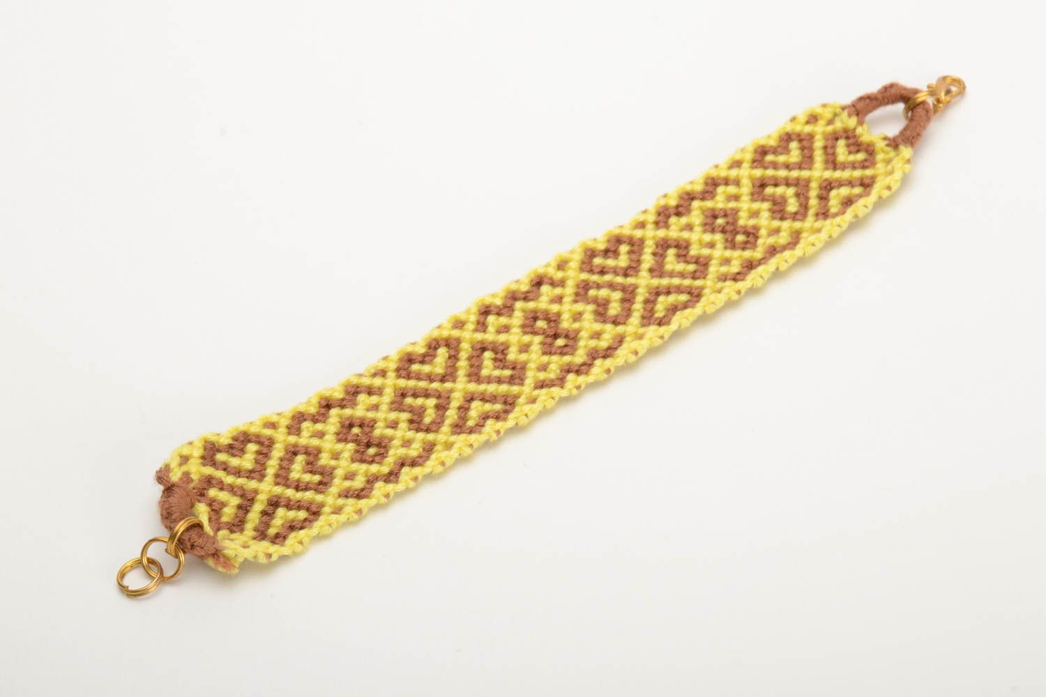 Handmade colored woven wide friendship bracelet made of floss threads yellow with beige photo 4