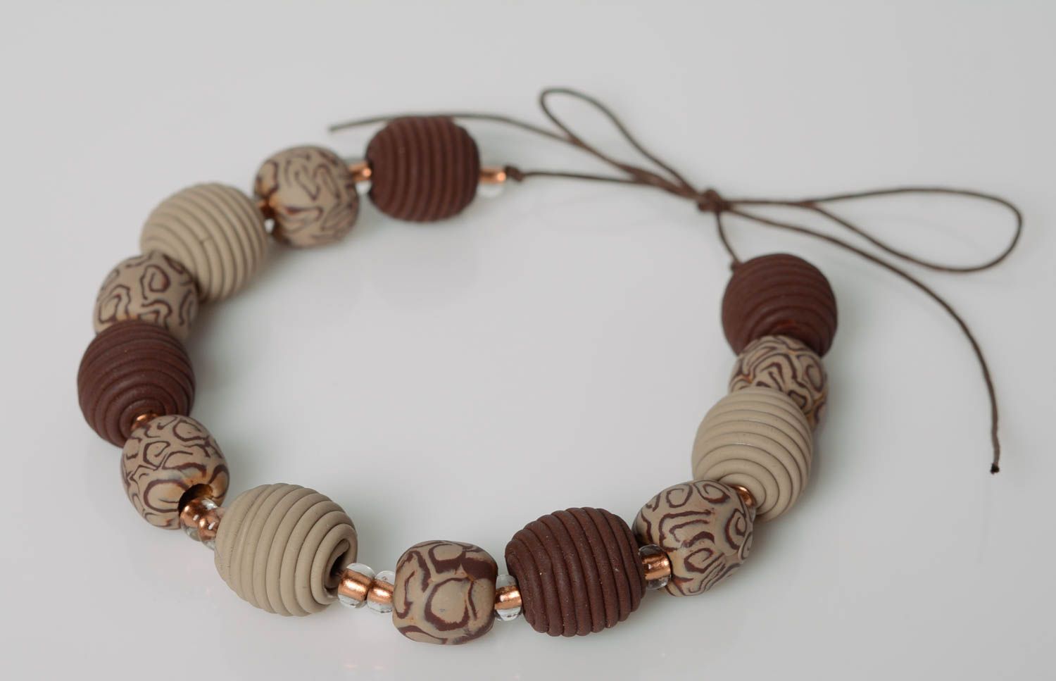 Handmade brown necklace made of polymer clay with large beads handmade on waxed cord photo 1