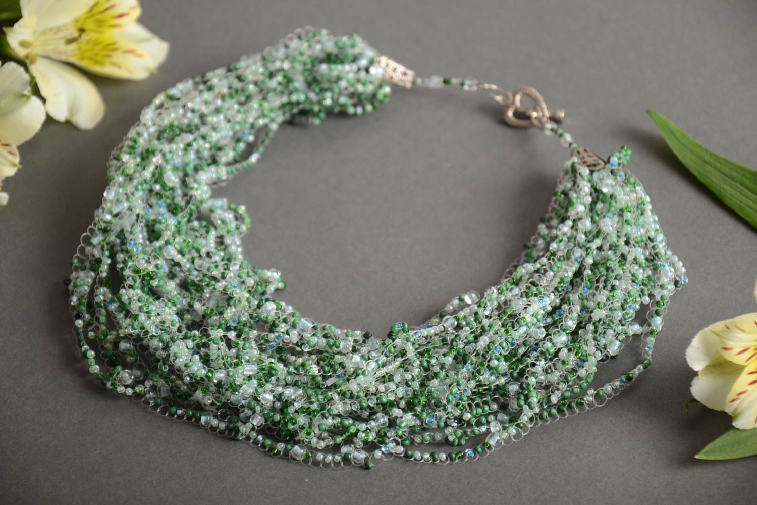 Handmade designer airy multi row necklace crocheted of light green beads  photo 1