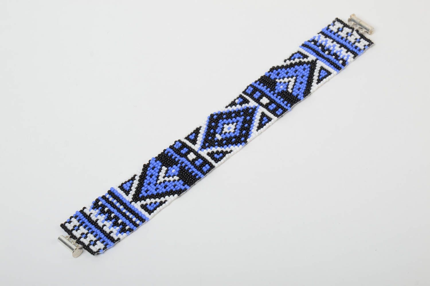 Blue and white handmade beaded wide bracelet with ornament in ethnic style photo 3