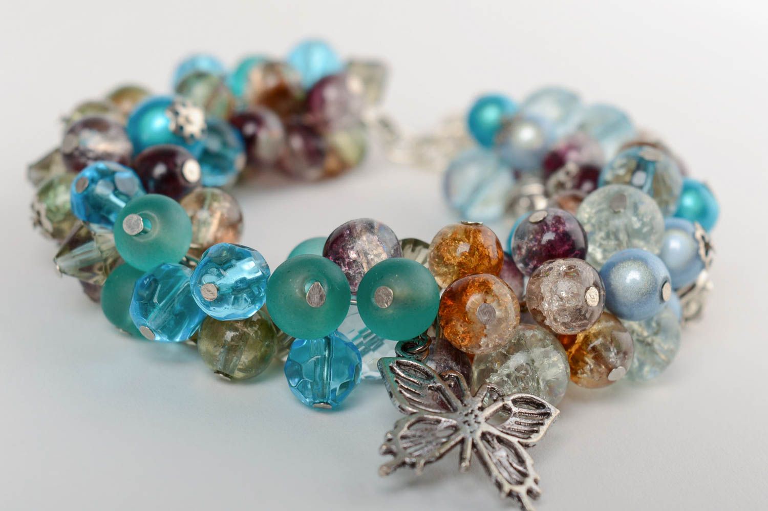 Handmade festive beautiful bracelet made of crystal and glass with charms photo 2