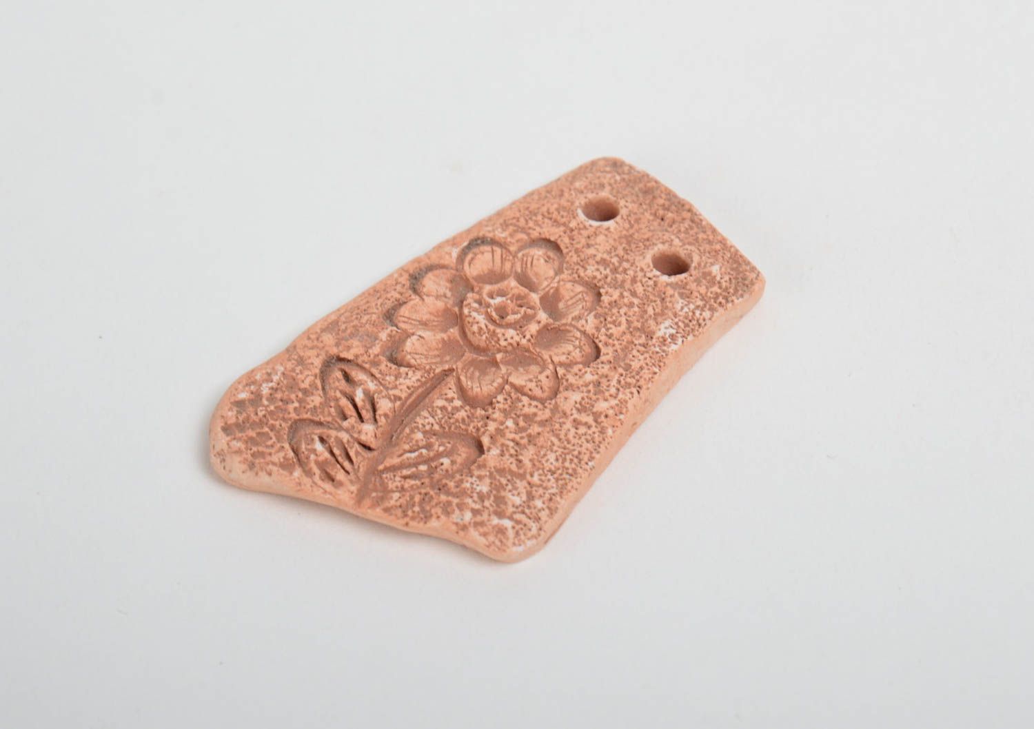 Handmade small flat ceramic pendant for painting with scratched flower pattern  photo 4