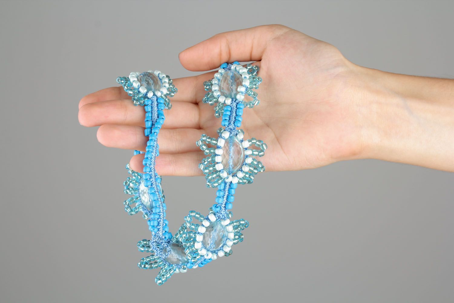 Blue macrame necklace made using the techniques of macrame and ankars photo 2