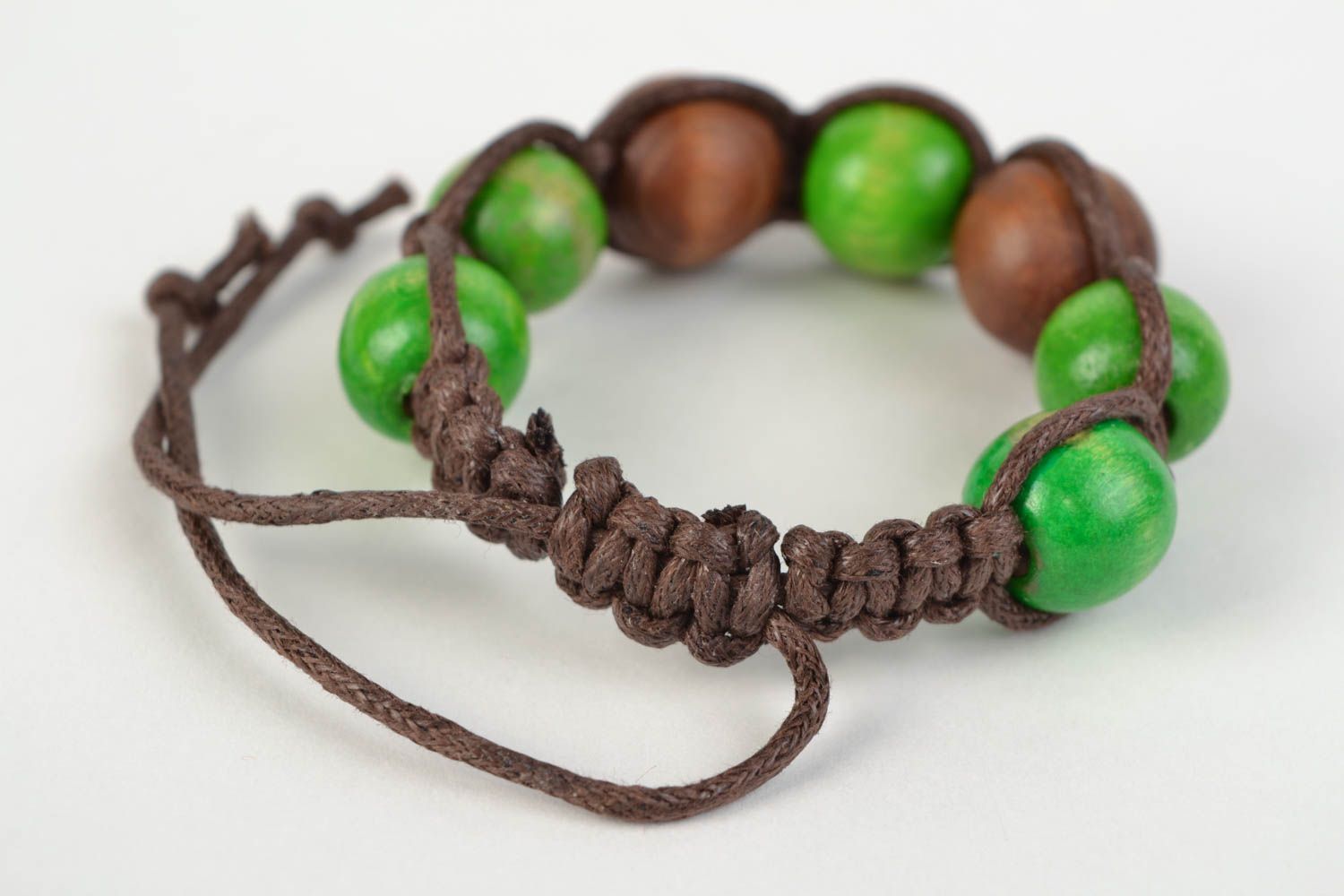 Handmade woven cotton cord bracelet with wooden beads photo 5