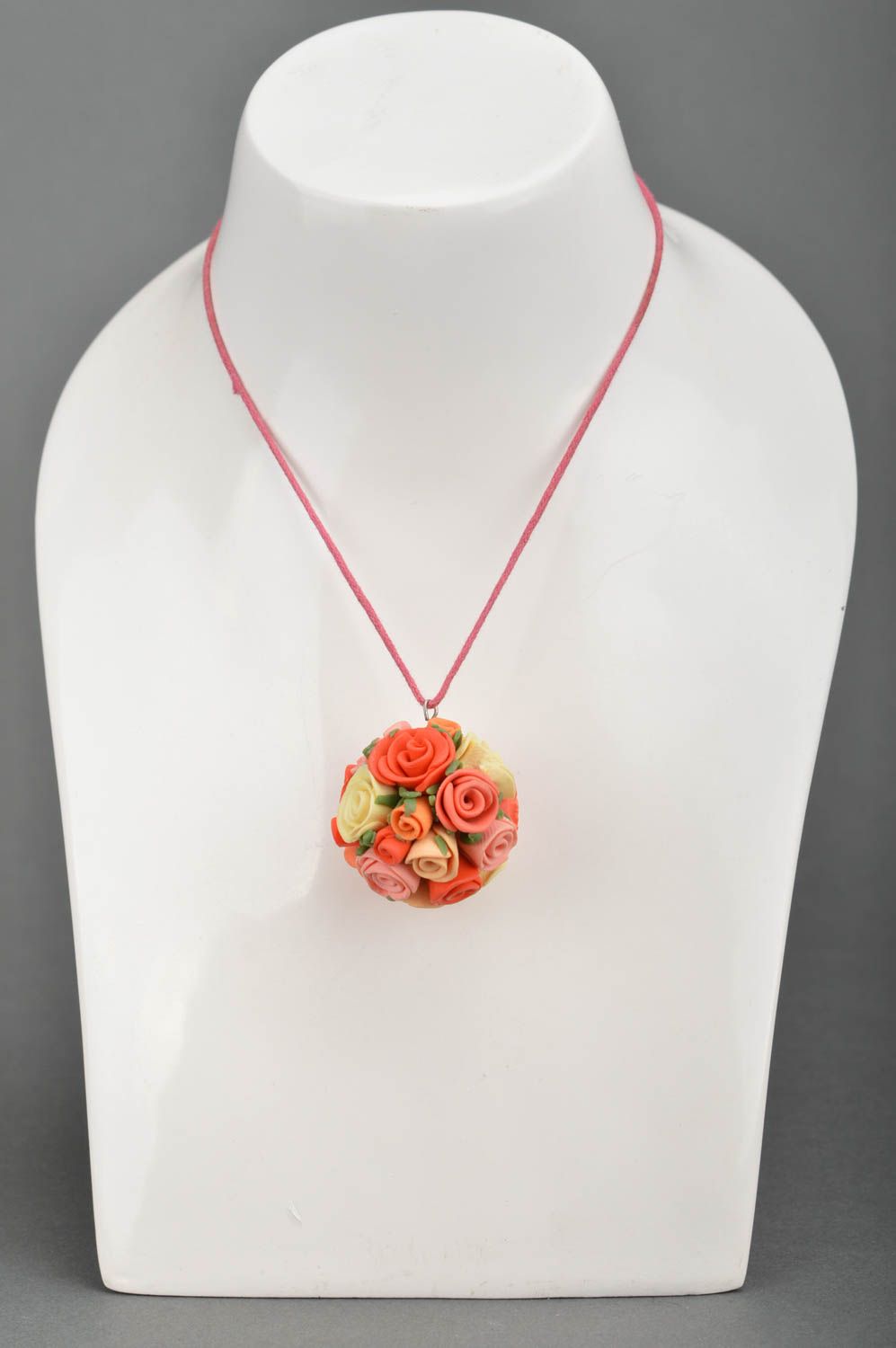 Handmade gorgeous pendant made of polymer clay in orange tones on cord photo 2