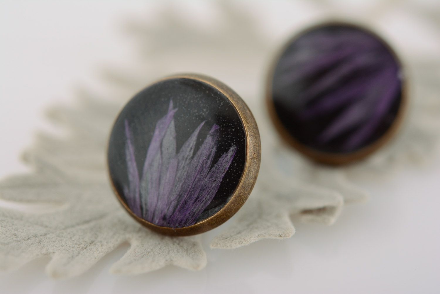Handmade round black stud earrings with dried flower embedded in epoxy resin photo 1