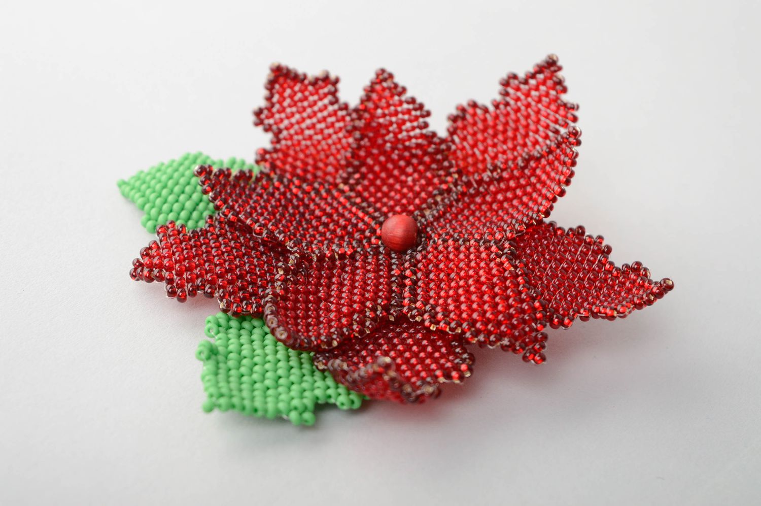 Beaded brooch in the shape of red flower photo 1