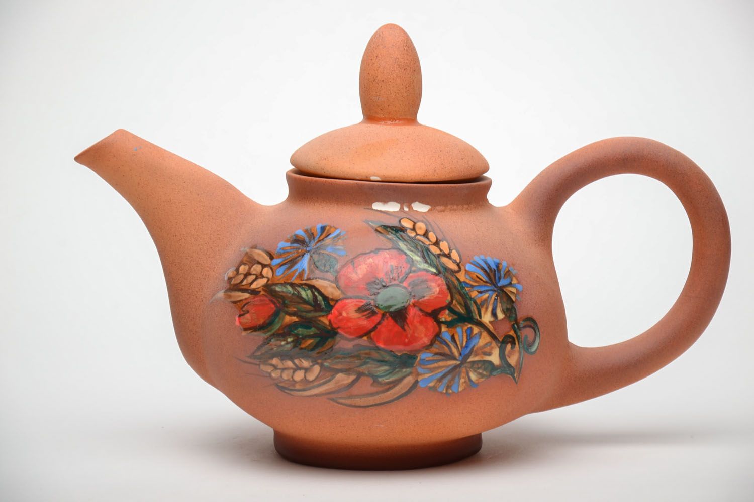 Handmade ceramic teapot with ornaments photo 2